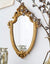 Vintage Decorative Mirror - Gold Shield Shape